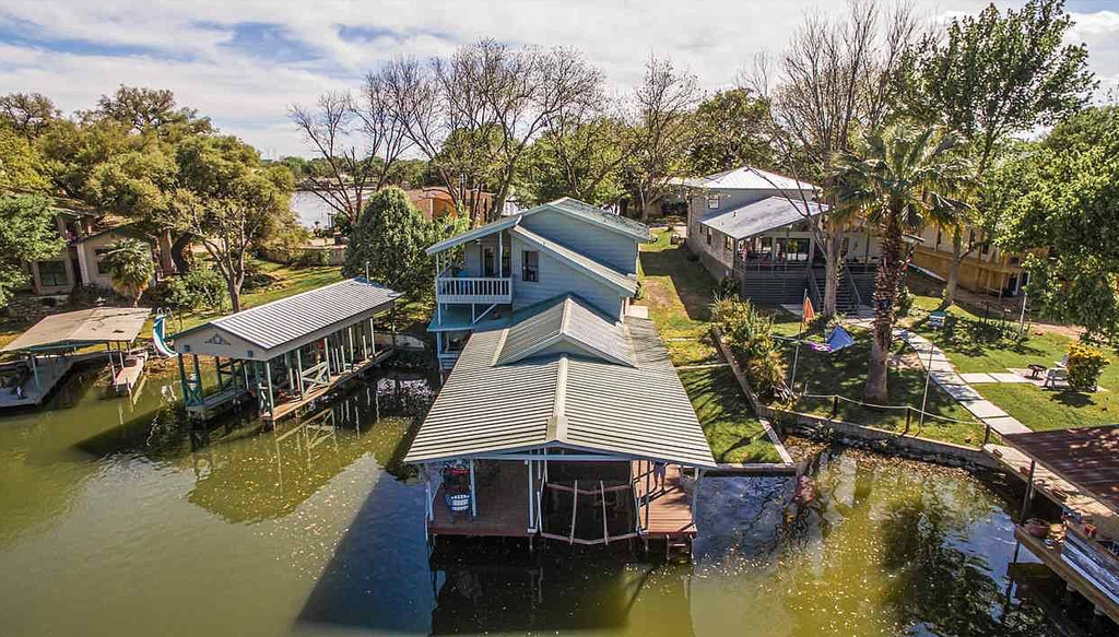 Lakefront home on water with great views, boat dock, al fresco dining, and WiFi