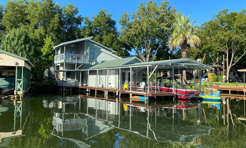 Lakefront home on water with great views, boat dock, al fresco dining, and WiFi