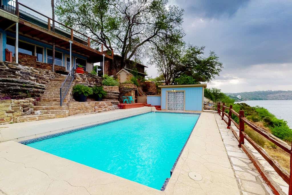 Mid-century modern lake house w/private waterfront pool & boat dock