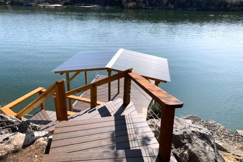 Mid-century modern lake house w/private waterfront pool & boat dock