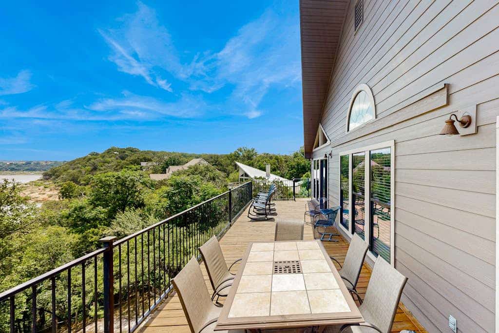 Spacious lakefront hideaway with decks, grill, billiards, tennis & pool
