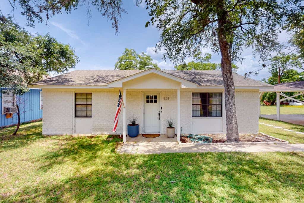 Dog-friendly waterfront home with dock, grill, water views, patio, washer/dryer