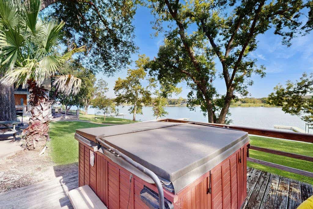 Lakefront home with dock, patio, kayaks, & central AC - dog-friendly