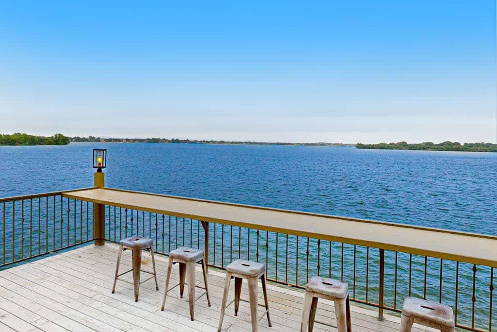 Luxe lakefront retreat with private pool, spa, lakeside terrace, gourmet kitchen