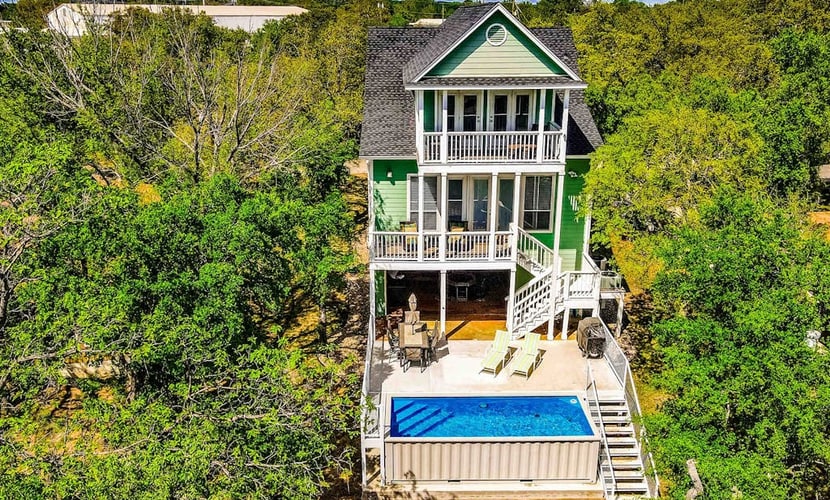 Waterfront home with game room, decks, pool, smart TVs, kayaks, & gas grill