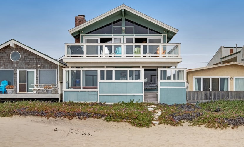 Beachfront home with amazing ocean views, a two-level deck, and bikes
