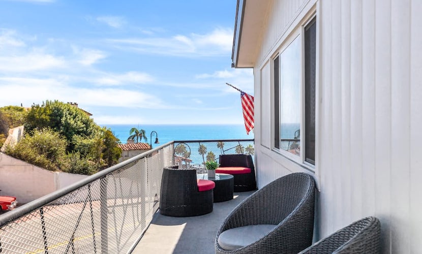 Dog-friendly condo with an ocean view, balcony & pool - beach across the street