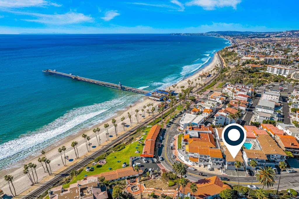 Dog-friendly condo with an ocean view, balcony & pool - beach across the street