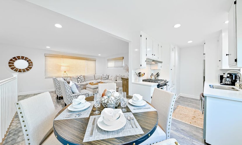 Newly remodeled home with kitchens, great location, fireplace, balcony, & patio