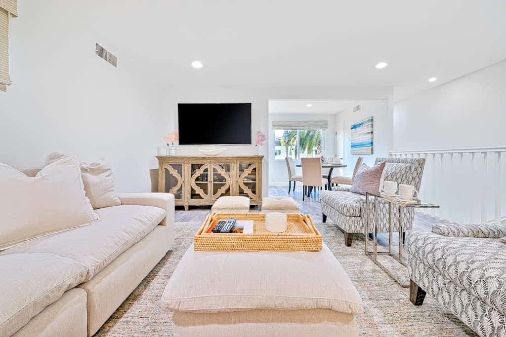 Newly remodeled home with kitchens, great location, fireplace, balcony, & patio