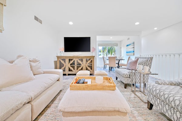 Newly remodeled home with kitchens, great location, fireplace, balcony, & patio