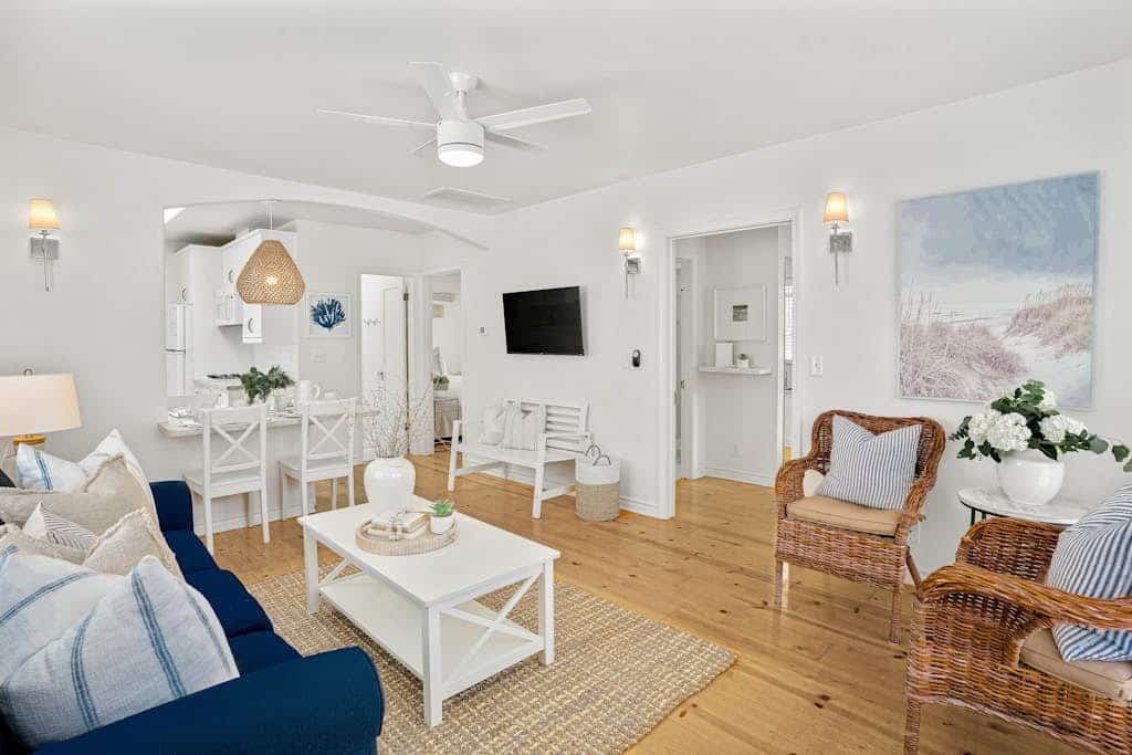 Ground-floor beach cottage with a furnished patio, AC, parking, & washer/dryer