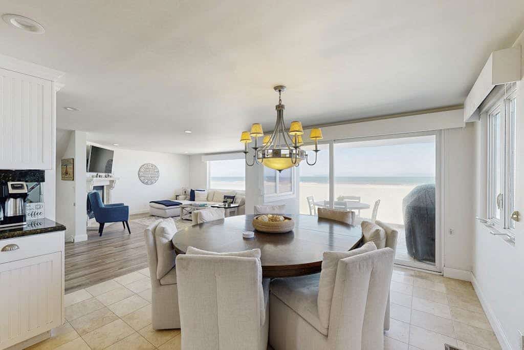 Incredible beachfront home with furnished patio, balcony & free WiFi