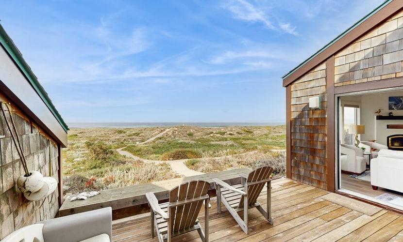 Beachfront condo with private patio, beach access, shared pool & hot tub.