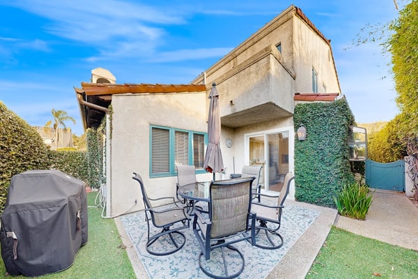 Lovely home with furnished patio, grill & ocean views - close to the beach