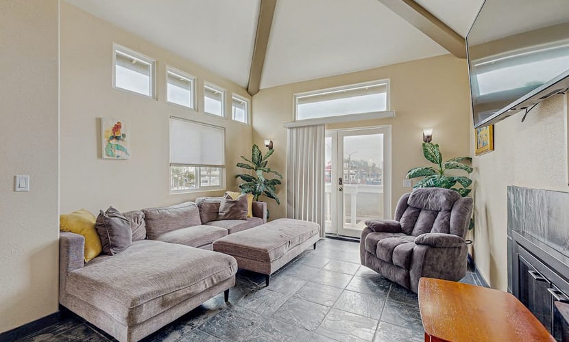 Two-story duplex near the beach with gas grill, balcony, great views, & WiFi