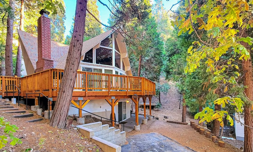 Enchanting lake retreat with fireplace, games, & great deck views - dog-friendly