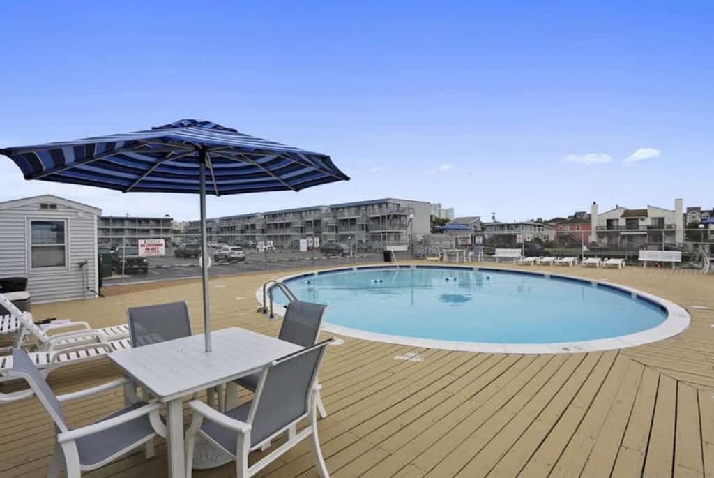 Inviting Bayfront escape with outdoor seating, pool, and great location