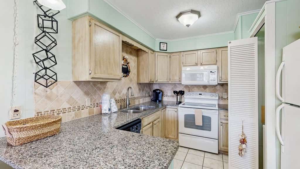 Inviting Bayfront escape with outdoor seating, pool, and great location