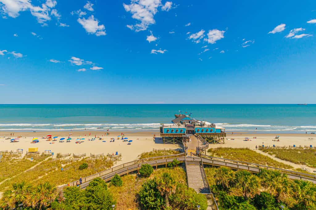 Welcome to your oceanfront retreat at Yachtsman Resort South Tower, where breathtaking Atlantic views and an unbeatable Myrtle Beach location come together to create the perfect coastal getaway. Perched on the 7th floor, Yachtsman 701 offers a warm and inviting atmosphere just steps from the famous Myrtle Beach Boardwalk and the historic 14th Avenue Pier. Whether you're planning a romantic escape, a family vacation, or a weekend by the ocean, this beautifully situated condo provides the ideal setting to relax, recharge, and make unforgettable memories.