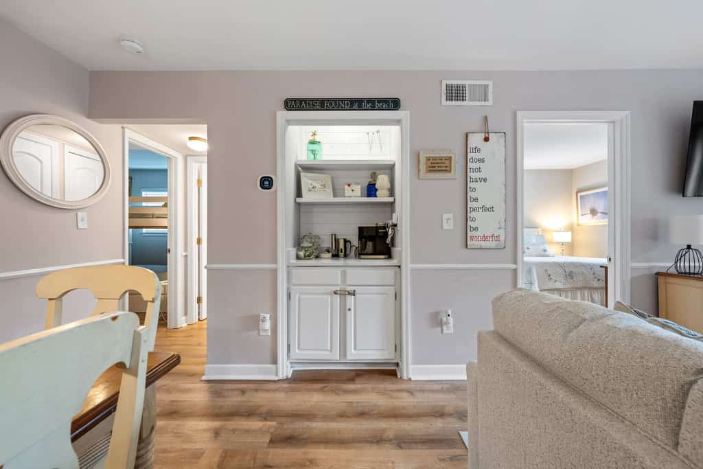 Fiddlers Cove 6i
Escape to Hilton Head Island and enjoy the perfect combination of beachside convenience, resort amenities, and laid-back coastal comfort. Nestled within the gated Fiddler's Cove Beach & Racquet Club community, this inviting third-floor condo is just a short walk from the sandy shores of Folly Field Beach, making it an ideal destination for families, couples, and small groups seeking a memorable island getaway.

Surrounded by lush tropical landscaping and peaceful lagoon views, the condo offers a relaxing setting where you can start your mornings with coffee on the private balcony and end your evenings listening to the sounds of nature. The lagoon is often home to local wildlife, including turtles and coastal birds, creating a true Lowcountry experience right outside your door.

Inside, you'll find bright, comfortable living spaces designed for easy vacation living. The open-concept layout provides plenty of room to gather after a day at the beach, while high-speed Wi-Fi, Smart TVs, central heating and air conditioning, and an in-unit washer and dryer offer all the comforts of home.

The condo comfortably accommodates up to six guests with two bedrooms, & two full bathrooms.

Bedroom Configuration
Primary Bedroom: Queen bed, Smart TV, and private ensuite bathroom
Guest Bedroom: Double Bunk with steps into the top double bunk. Bunk bed features a twin trundle. 
Smart TV, closet, and access to a full hallway bathroom

Enjoy a beach wagon and beach chairs with this rental!
