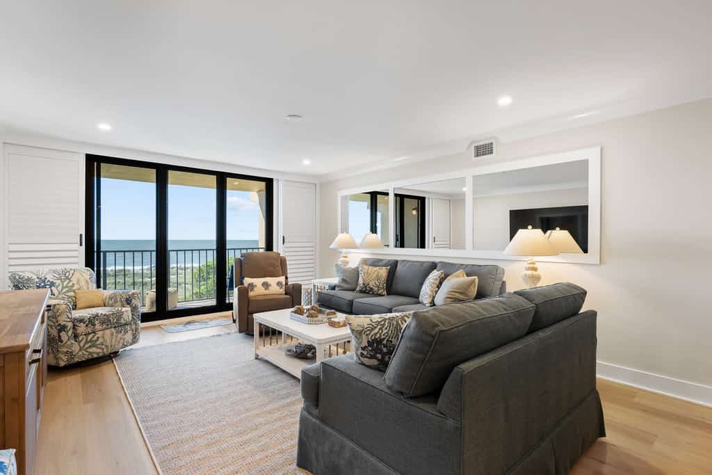 Island Club 5401 
Luxury Oceanfront Retreat | Panoramic Views from Every Bedroom
Experience coastal luxury at its finest in this completely renovated 3-bedroom, 3-bath oceanfront condominium. Perfectly situated on the 4th floor, this premier beachfront retreat offers breathtaking panoramic ocean views, direct beachfront access, and upscale finishes throughout.

From the moment you enter, you'll be captivated by the stunning ocean vistas visible from the living area dining, kitchen and all three bedrooms. Every detail has been thoughtfully redesigned, featuring brand-new furnishings, designer finishes, custom plantation shutters, and a bright, sophisticated coastal aesthetic.

The spacious living offers a new surround sound system with a large flat screen TV. This living space is open to the kitchen with counter seating, a large dining table, and a comfortably furnished oceanfront patio, creating the perfect setting for morning coffee, afternoon relaxation, or evening cocktails while enjoying the sights and sounds of the Beach & ocean waves. 

Gourmet Kitchen

The fully renovated and exceptionally stocked kitchen is designed for both everyday convenience and entertaining, featuring:

New designer cabinetry and premium countertops
Triple-filtered drinking water at the kitchen sink
New stainless steel appliances
Separate beverage refrigerator
12-cup drip coffee maker and Keurig® coffee maker
Air fryer, blender, popcorn maker, and more
Everything needed to prepare meals with ease
Luxurious Sleeping Accommodations

Primary Oceanfront Suite

King bed
Private oceanfront balcony with seating
Spa-inspired ensuite bathroom
Double vanity
Large walk-in tiled shower
Flat-screen TV
Dedicated workspace/desk
Custom built-in closet shelving
Spectacular ocean views

Second Oceanfront Guest Suite

Two queen beds
Private ensuite bathroom with walk-in shower
Double Vanity Sink
Oceanfront views
Flat-screen TV
Corner desk/workspace
Ideal for couples or families

Third Ocean View Guest Bedroom

Two queen beds
Flat Screen TV
Ocean views
Access to hall bathroom with tub/shower combination
Additional Features
Full-size washer and dryer
Keyless Entry
New high-efficiency air conditioning system and ductwork
High-speed Wi-Fi
Flat-screen TVs
Custom plantation shutters throughout
Professionally furnished and decorated
Direct Beachfront Location

ONSITE AMENITIES:
Private Serene Oceanfront Complex on 25 Beautiful Amenity Rich Acres 
Amenities include 3 Swimming Pools including an area with sundeck and hot tub for adults only.
• Outdoor Lap Pool & Kiddy Pool (Heated Seasonally)
• Community Spa, Tanning Shelf and Top Deck (Seasonally ages 18+)
• 9 Tennis Courts: 7 Har-Tru (Clay) Courts and 2 Hard Courts
• Pickleball
• Exercise Facility
• Bike Rentals
• Basketball
• Children's playground right off the beach
• Catch and Release Fishing Lagoons
• Community Grills and Picnic Areas
• Elevators

The Island Breeze Trolley has a convenient stop within a short walk from the Island Club complex.

Whether you're planning a family beach vacation, a couples' getaway, or a relaxing coastal escape, this exceptional oceanfront residence offers the very best in luxury, comfort, and location. With panoramic views, designer renovations, and every modern convenience imaginable, this is truly the premier beachfront experience you've been searching for.

Book your stay and discover why this is one of the finest oceanfront vacation rentals on the coast.