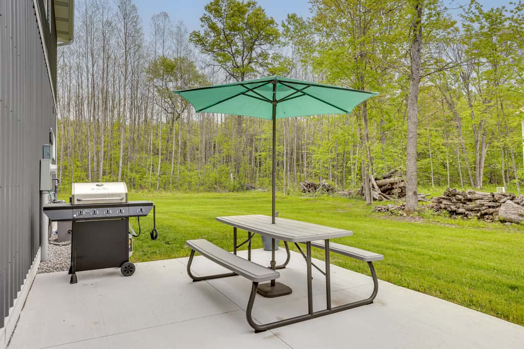 Pet-Friendly Higgins Lake Home w/ Fire Pit