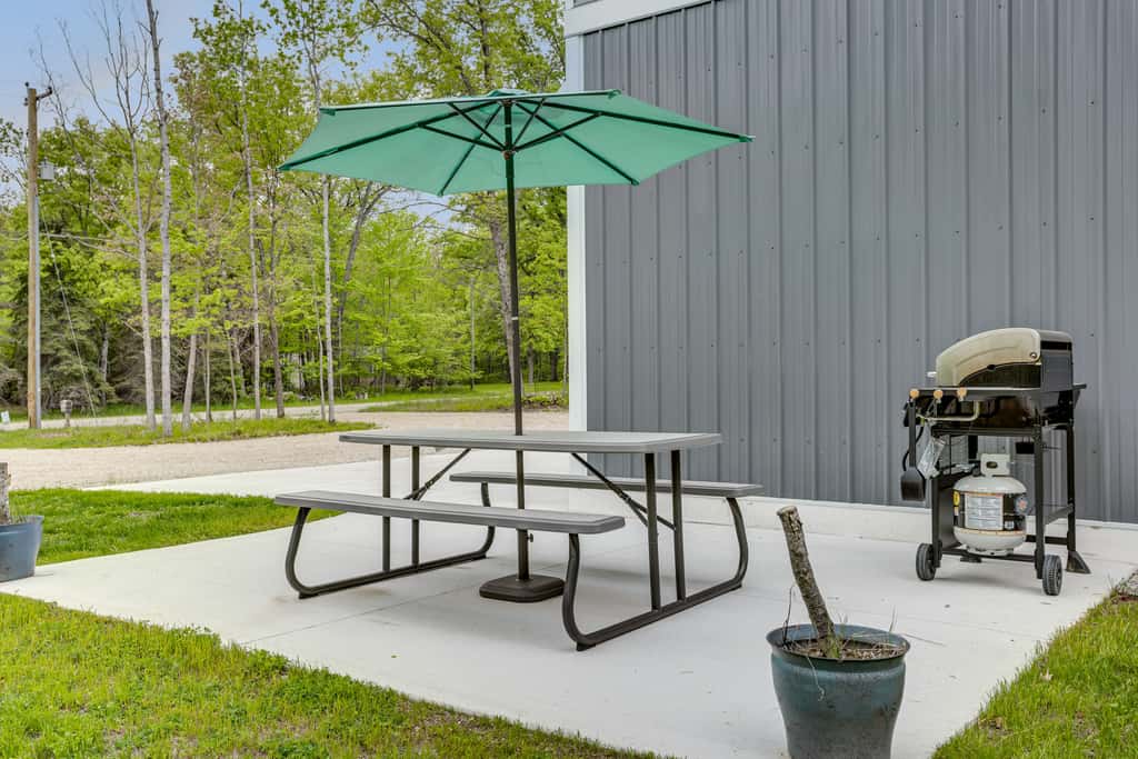Pet-Friendly Higgins Lake Home w/ Fire Pit