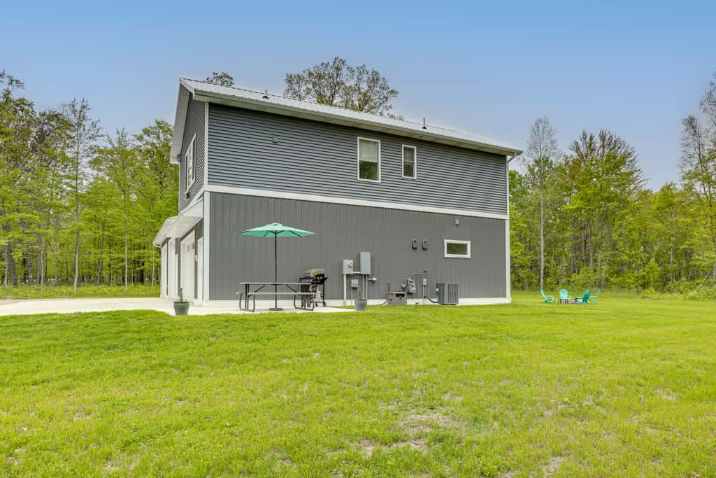 Pet-Friendly Higgins Lake Home w/ Fire Pit