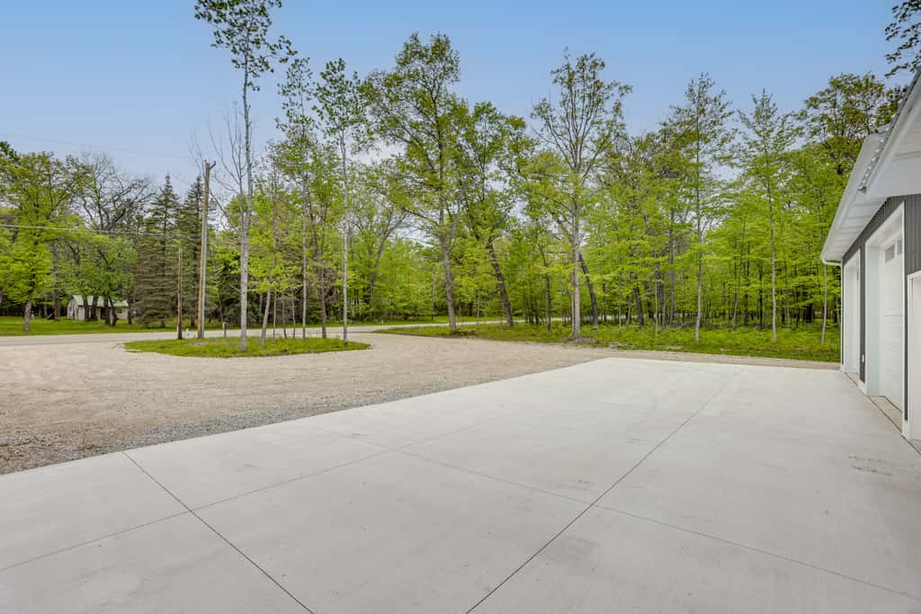 Pet-Friendly Higgins Lake Home w/ Fire Pit