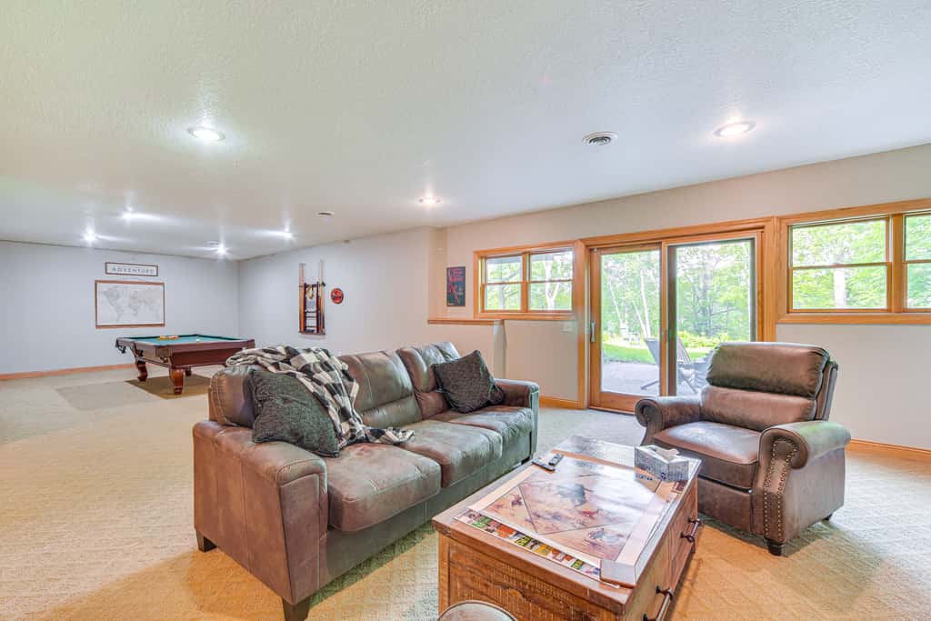 Riverfront Bliss in Rice Lake: Deck, Grill & Hike!