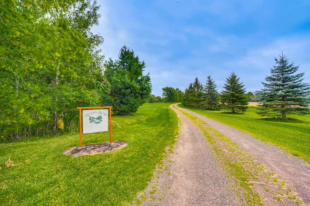 Riverfront Bliss in Rice Lake: Deck, Grill & Hike!