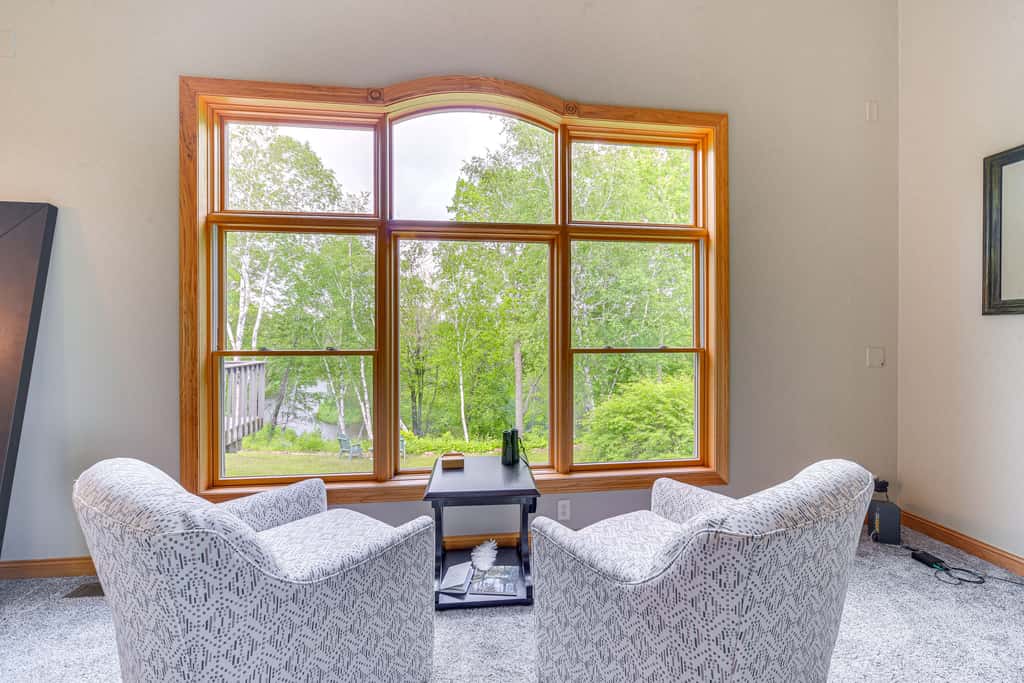 Riverfront Bliss in Rice Lake: Deck, Grill & Hike!