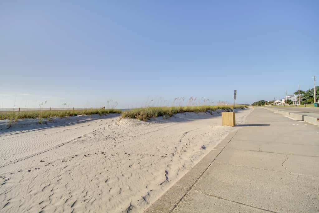 Sunny Waveland Home Rental w/ Pool: Walk to Beach!