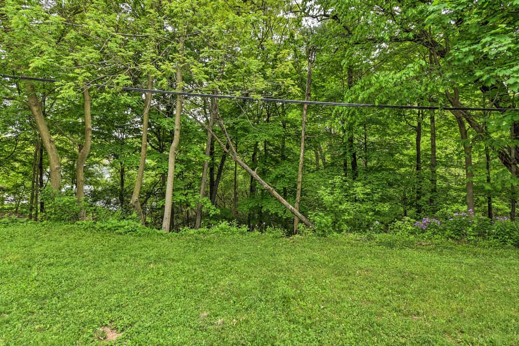 Walkable Lake Elkhart Apt: Dine, Shop, Swim!
