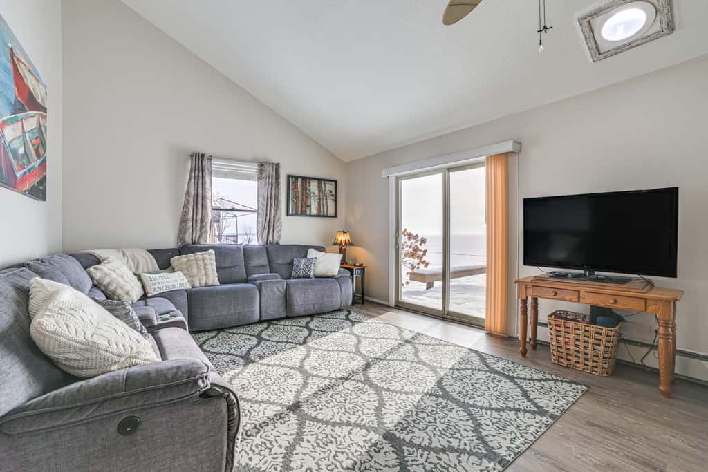Porch + Views: Waterfront Home on Houghton Lake!
