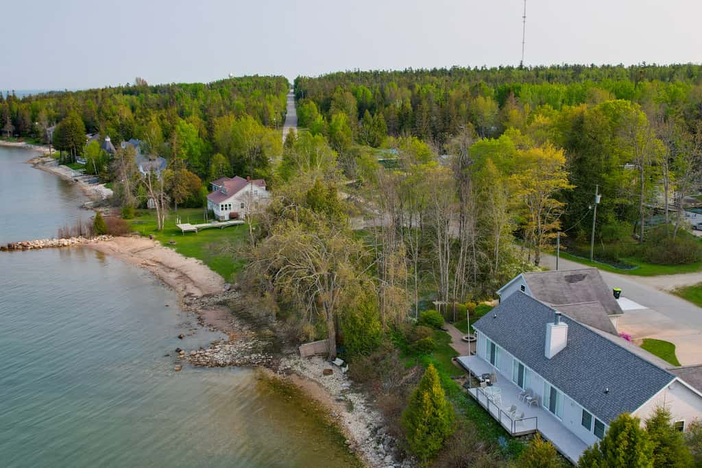 Lakefront De Tour Village Home w/ Deck & Fire Pit!