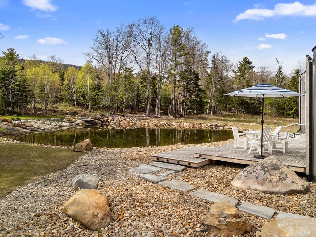 Enjoy tranquil pond views at The Pond House in Lincolnville, ME—2300 sq ft, 3 beds.