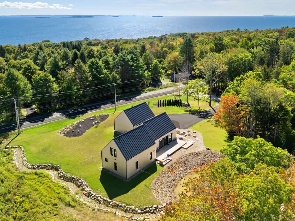 Enjoy tranquil pond views at The Pond House in Lincolnville, ME—2300 sq ft, 3 beds.