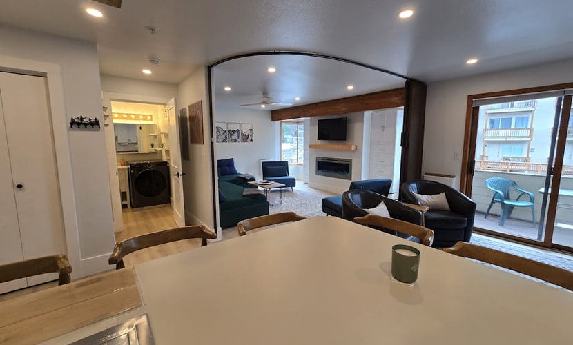 A clever second-floor studio condo engineered for the kind of alpine trip where mornings start directly at the lift and evenings end at the village brewery. Sited ski-in/ski-out at the base of Alyeska Resort, this property puts cafes, pubs, and premier ski trails right at your doorstep. The layout features a well-equipped full kitchen, a four-person breakfast bar for efficient pre-ski fuel, and a functional Murphy bed setup with a dedicated curtain partition to separate the sleeping space from the living lounge. Take your morning coffee out onto the furnished private balcony pointed straight at the Chugach peaks. *No elevator.* Standard Specs: Full kitchen with breakfast bar, private balcony, curtain privacy partition, flat-screen TV, high-speed WiFi, and keypad entry. Dedicated parking for one vehicle. Fireplace non-operational per local regulations. Building requires stair access. Sleeps 4.