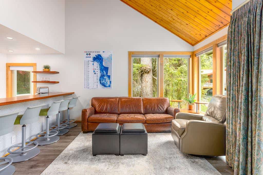 The kind of condo where the family math actually works—two large private bedrooms, a spacious upstairs loft for the kids, beautiful mountain views from every sleeping zone, and an open-concept living room centered around a roaring, authentic wood-burning fireplace. Positioned within easy walking distance of the Alyeska chairlifts, local hiking paths, the village restaurants, and the mercantile for groceries, this townhome completely simplifies your vacation logistics. An exceptional, comfortable basecamp well-positioned for regional day trips to Whittier, the Kenai River, or Anchorage. Standard Specs: Fully equipped kitchen, wood-burning fireplace, two full bathrooms with walk-in showers, high-speed internet with smart streaming TVs, and keypad entry. Dedicated parking for one vehicle. All planned gatherings require prior owner approval. Sleeps 6.