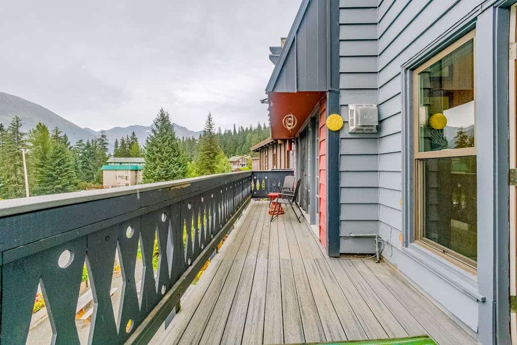 The centerpiece of this premium slopeside condo is an iconic 360-degree fireplace that sits directly in the middle of the open living room, radiating warmth throughout the entire space. Boasting uncompromised full mountain views and true ski-in/ski-out lift access, this one-bedroom-plus-loft condo sits right in the heart of Alaska's ski country. The bright, welcoming interior features a private deck for morning coffee or apres-ski drinks, a well-appointed kitchen, and smart entertainment streams. Positioned directly on the Girdwood shuttle line, the property offers quick walking access to the resort spa facility, trailheads, and valley fine dining. Shared building laundry is located inside the complex. Standard Specs: Full kitchen, 360-degree center fireplace, private viewing deck, flat-screen Smart TV, high-speed WiFi, and keypad entry. Dedicated parking for one vehicle. On-site shared laundry. True ski-in/ski-out. Sleeps 4.