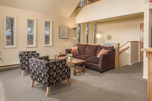 Hidden away in a quiet, peaceful neighborhood just a short half-mile walk to the lifts at Alyeska Resort—close enough to walk in ski gear, far enough that the neighborhood stays quiet. This charming four-bedroom home features an exceptional western exposure that fills the open living spaces with natural afternoon light across all seasons. The spacious floor plan features a roomy viewing deck with a gas grill for summer cookouts, a well-equipped full kitchen built to handle family meal times with ease, and complimentary high-speed WiFi. Settle in for a quiet weekend or use the home as a reliable staging point for day trips to Portage Valley, Crow Creek Mine, or the Kenai Peninsula. Standard Specs: Fully equipped kitchen, private viewing deck, gas grill, private in-unit washer/dryer, flat-screen TV, complimentary high-speed WiFi, and hospitality check-in instructions. Driveway parking for up to four vehicles. Quiet residential neighborhood. Sleeps 8.