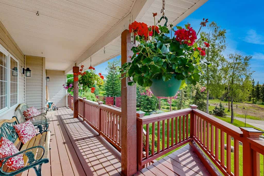 Positioned south of downtown Anchorage where the neighborhood quiets down and the local moose still regularly wander through the yard. This cozy upper-floor apartment serves as an exceptional retreat, located close to the Alaska Zoo, O'Malley's golf course, and local eateries. The architecture is engineered for cold-weather comfort, featuring premium radiant floor heating, a private indoor jetted tub, and an authentic wood stove inside the living lounge. Step out onto the massive shared front deck to soak in the bubbly outdoor hot tub while taking in views of the surrounding tree canopy and looking out for visiting wildlife. Standard Specs: Fully equipped kitchen, shared outdoor hot tub, large observation deck, wood stove, indoor jetted tub, radiant floor heating, flat-screen TV, high-speed WiFi, and keypad entry. Upper-floor layout. Driveway parking for two vehicles. Sleeps 5.