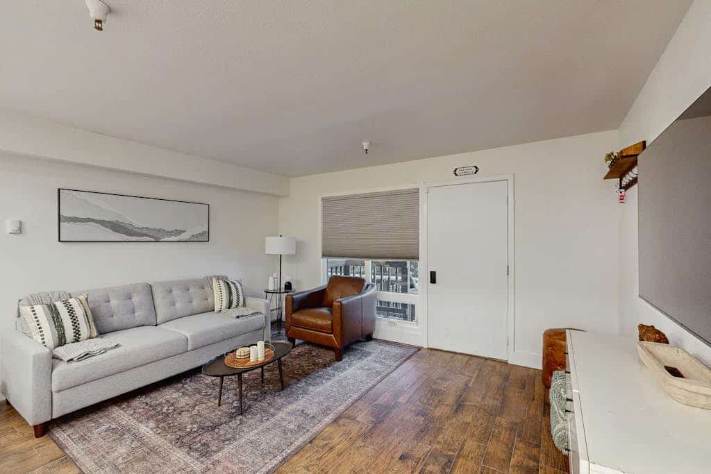 First Tracks earns its name—a fully renovated ski-in/ski-out condo located directly at the base of Mt. Alyeska in the Alyeska North building, engineered so your morning routine is down to one simple step: walk out and ski. Uniquely featuring its own entirely private front entrance, the suite boasts an updated open kitchen and living layout with an oversized bar top built for easy post-trail entertaining. Enjoy high-speed internet, Netflix streaming, a reserved building parking pass, and direct access to a building recreation room equipped with a custom pool table and games. Three restaurants, a bar, ski shops, and the chair lift are all within a quick walk. Standard Specs: Full kitchen with breakfast bar, private front entrance, flat-screen TV with Netflix streaming, high-speed WiFi, keypad entry, and building laundry/rec room access with pool table. Reserved building parking pass for one vehicle. True ski-in/ski-out. Sleeps 4.