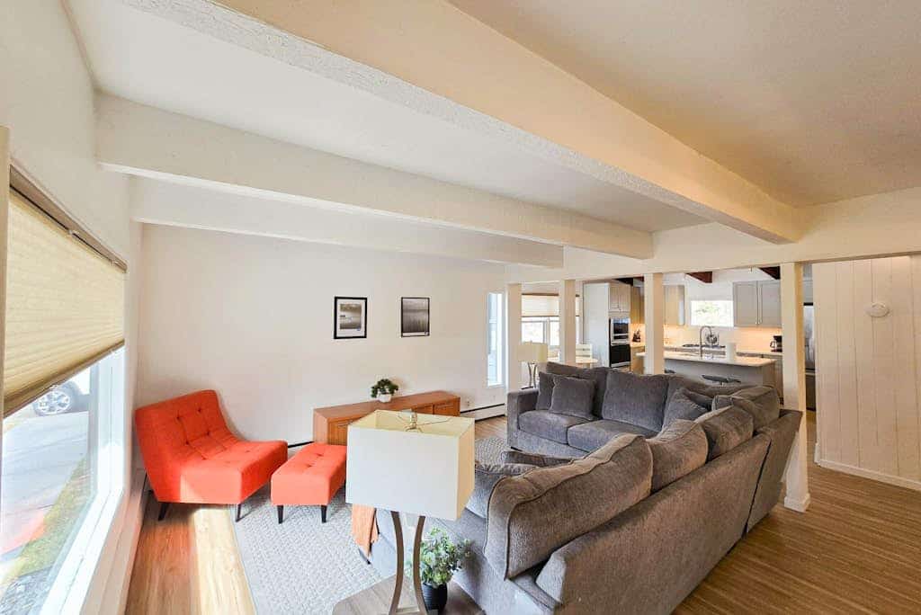 Single-level and easy to settle into, this Anchorage home keeps things uncomplicated — no stairs, a well-lit path to the door, and a layout that works whether you're traveling with family or just want a comfortable base close to town. The living area is made for the end of the day, with a TV and room to spread out, while the full kitchen handles real cooking with a stove, oven, dishwasher, and the rest of what you'd actually reach for. When the weather cooperates, the patio is the spot for a meal outside in the cool Alaskan air. Parks, shopping, and restaurants sit close by, and the bigger draws aren't far — city trails, wildlife viewing, fishing, kayaking, and the museums and gardens around Anchorage. Standard Specs: Full kitchen, queen and twin beds, in-home washer and dryer, high-speed WiFi, and a TV. Patio with outdoor seating. Free parking for two vehicles. Sleeps 3.