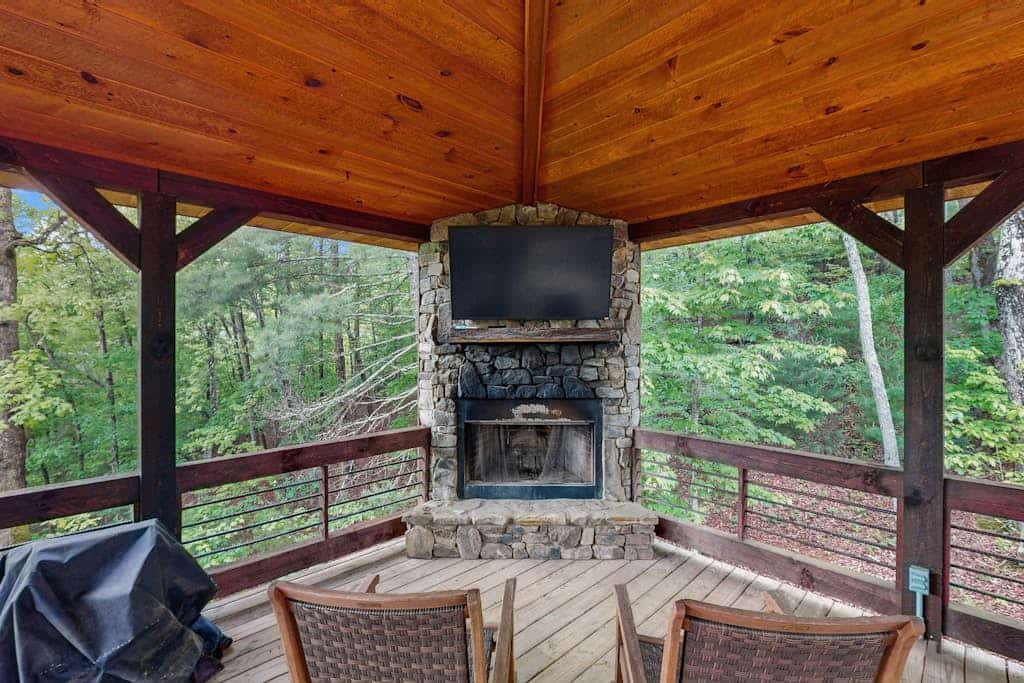 Gorgeous home with wraparound deck, private hot tub, and full bar