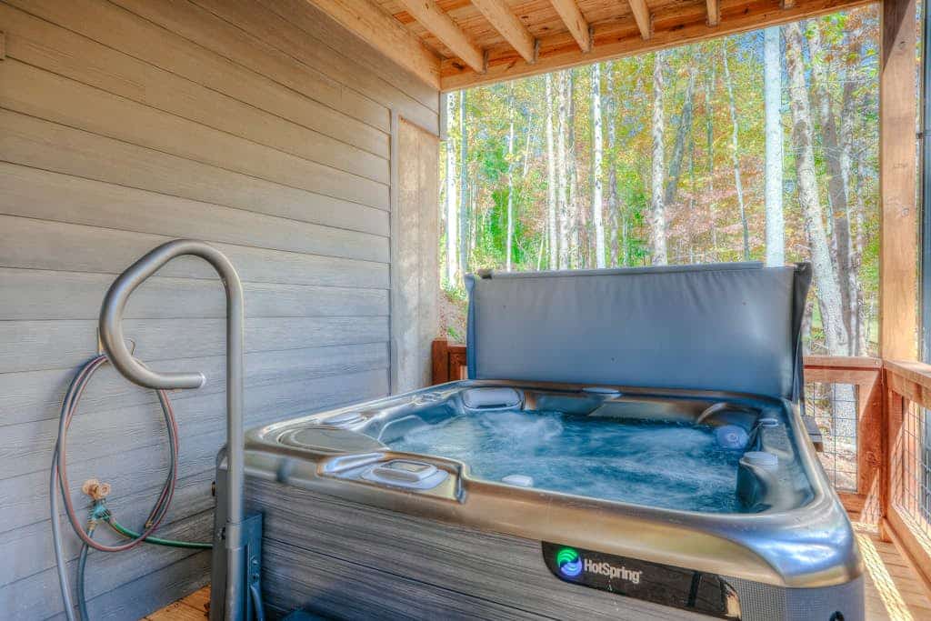 Cozy mountain oasis with hot tub, grill, fire pit and 1200 sf of deck