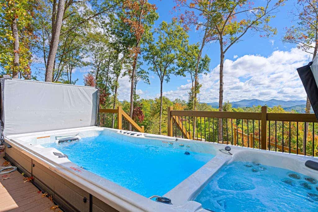 Dog-friendly, mountain-view cabin with hot tub, fireplaces, firepit, game room