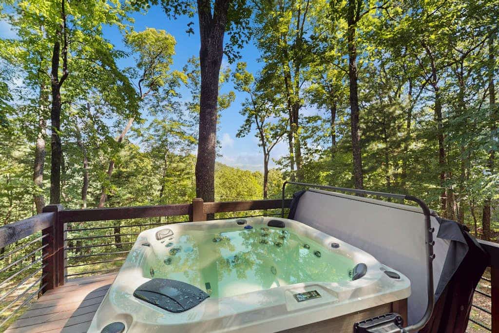 Cozy mountain cabin with breathtaking views, hot tub, and modern comforts